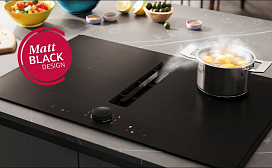 Варочная панель матово-черного цвета со встроенной вытяжкой | NEFF