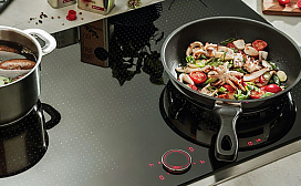 Переключатель TwistPad® Fire в индукционных варочных панелях NEFF